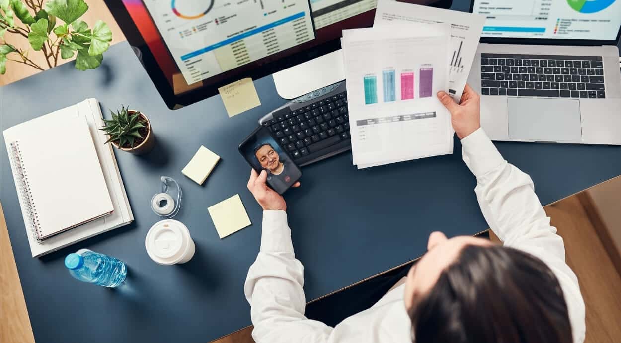 analyst reviewing charts and trends on a computer