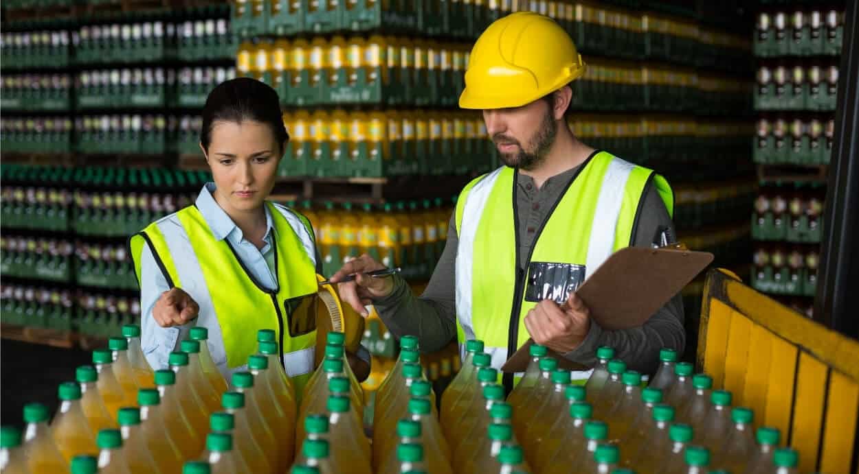 Coworkers calculating optimal lot size