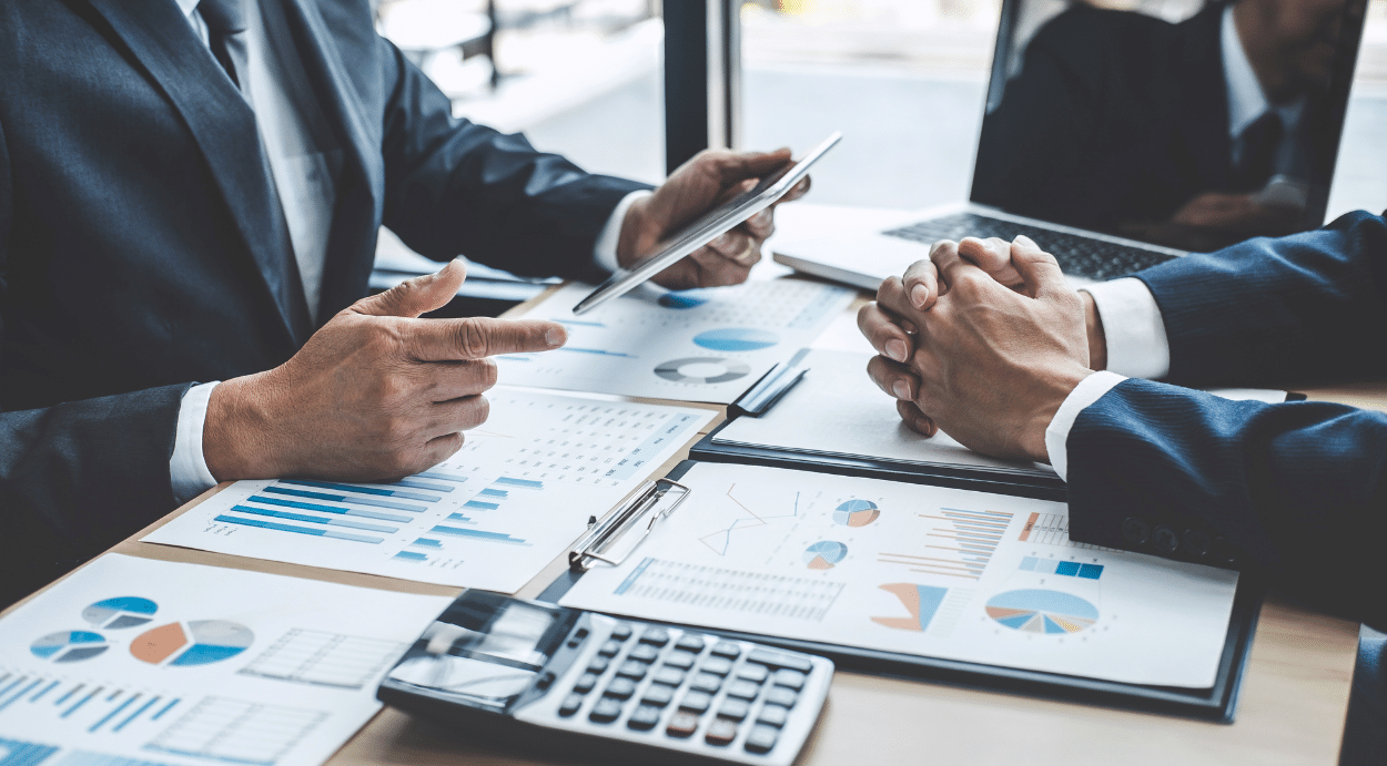 2 accountants reviewing some data.